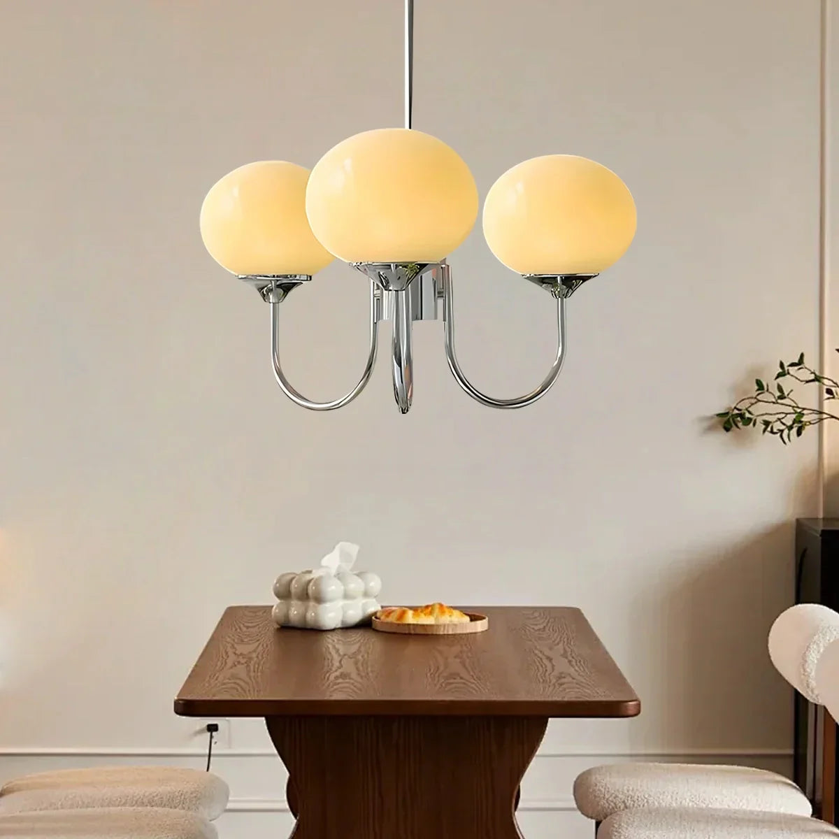 flairel Pink Glass Globe Arm Chandelier for Living Room